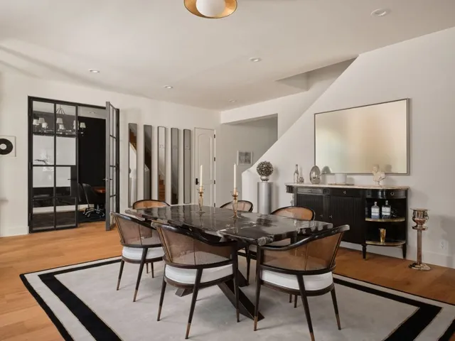 a view of a dining room with furniture