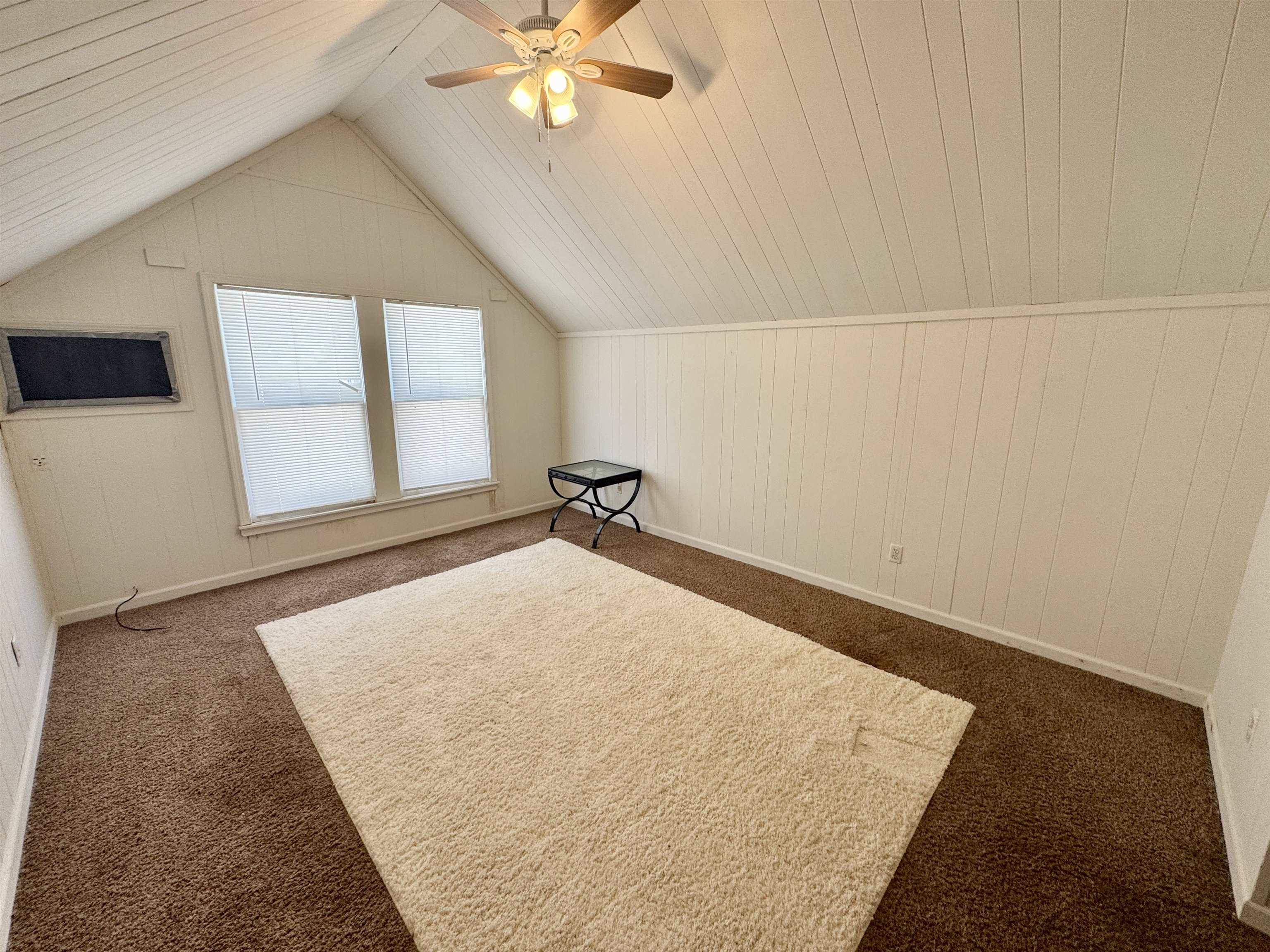 243 East End Street Ripley, TN 38063 - Photo 11 of 17 wooden floor in an empty room with a window