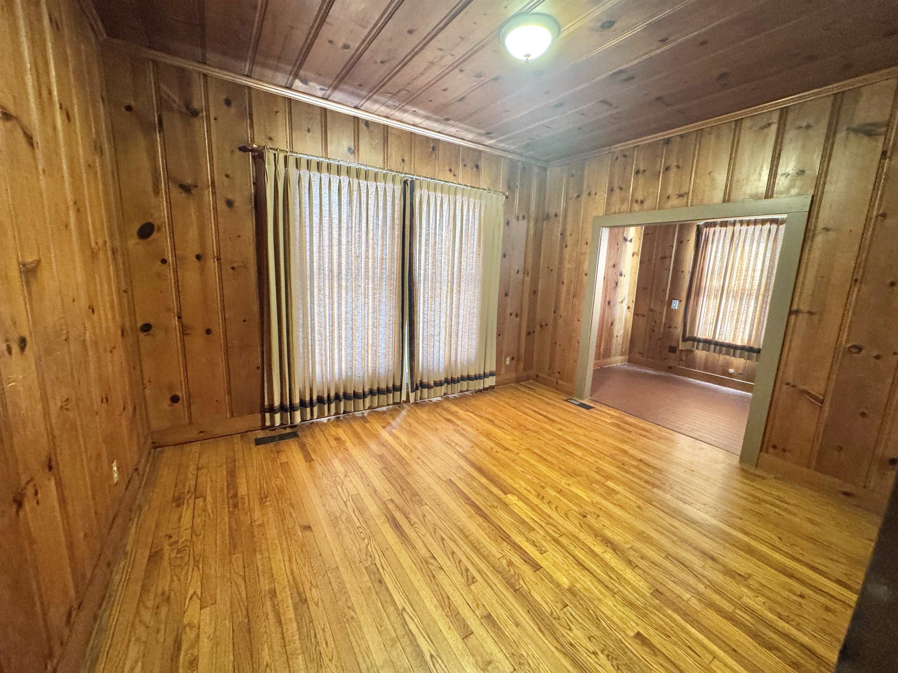 243 East End Street Ripley, TN 38063 - Photo 15 of 17 wooden floor in an empty room