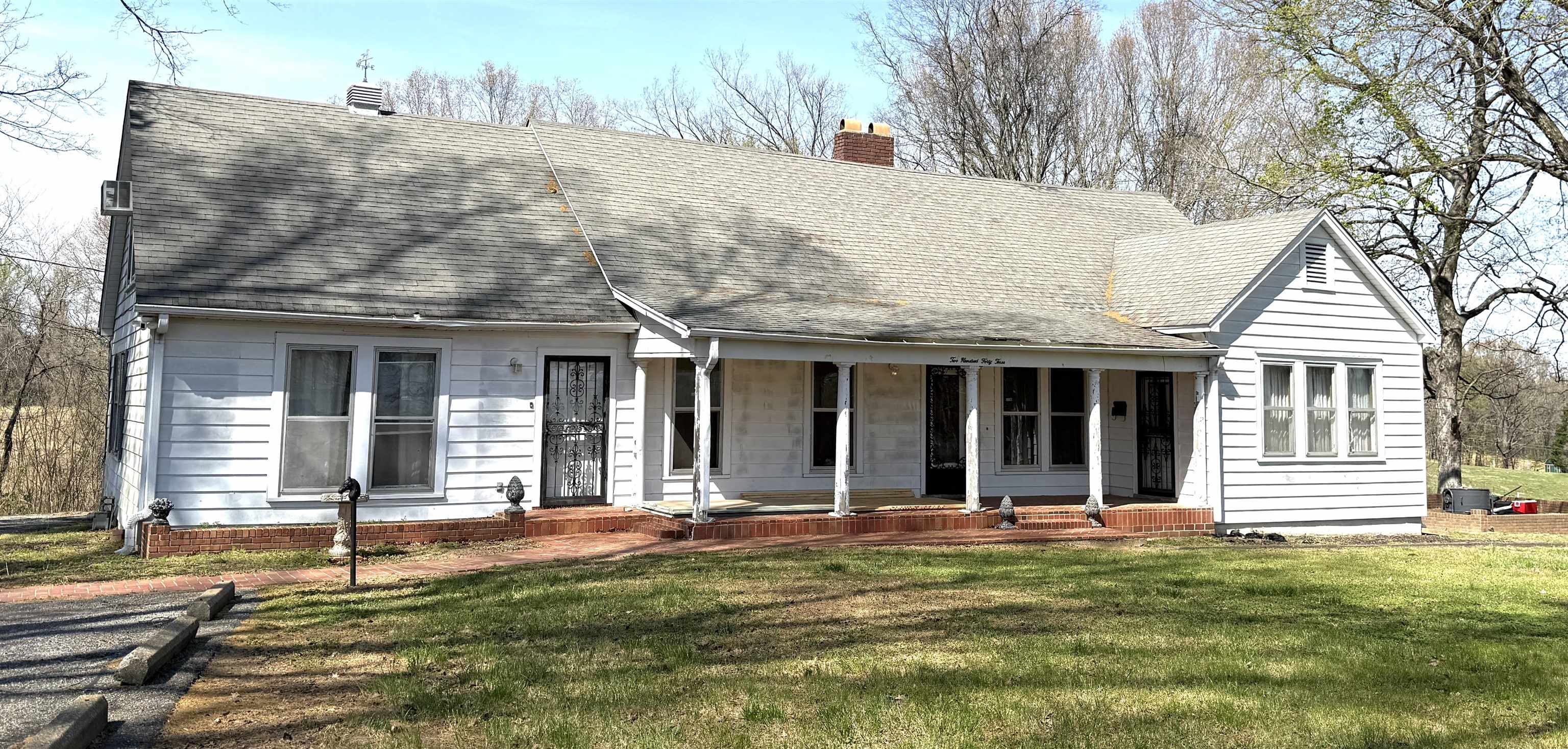 243 East End Street Ripley, TN 38063 - Photo 2 of 17 a front view of a house with a garden