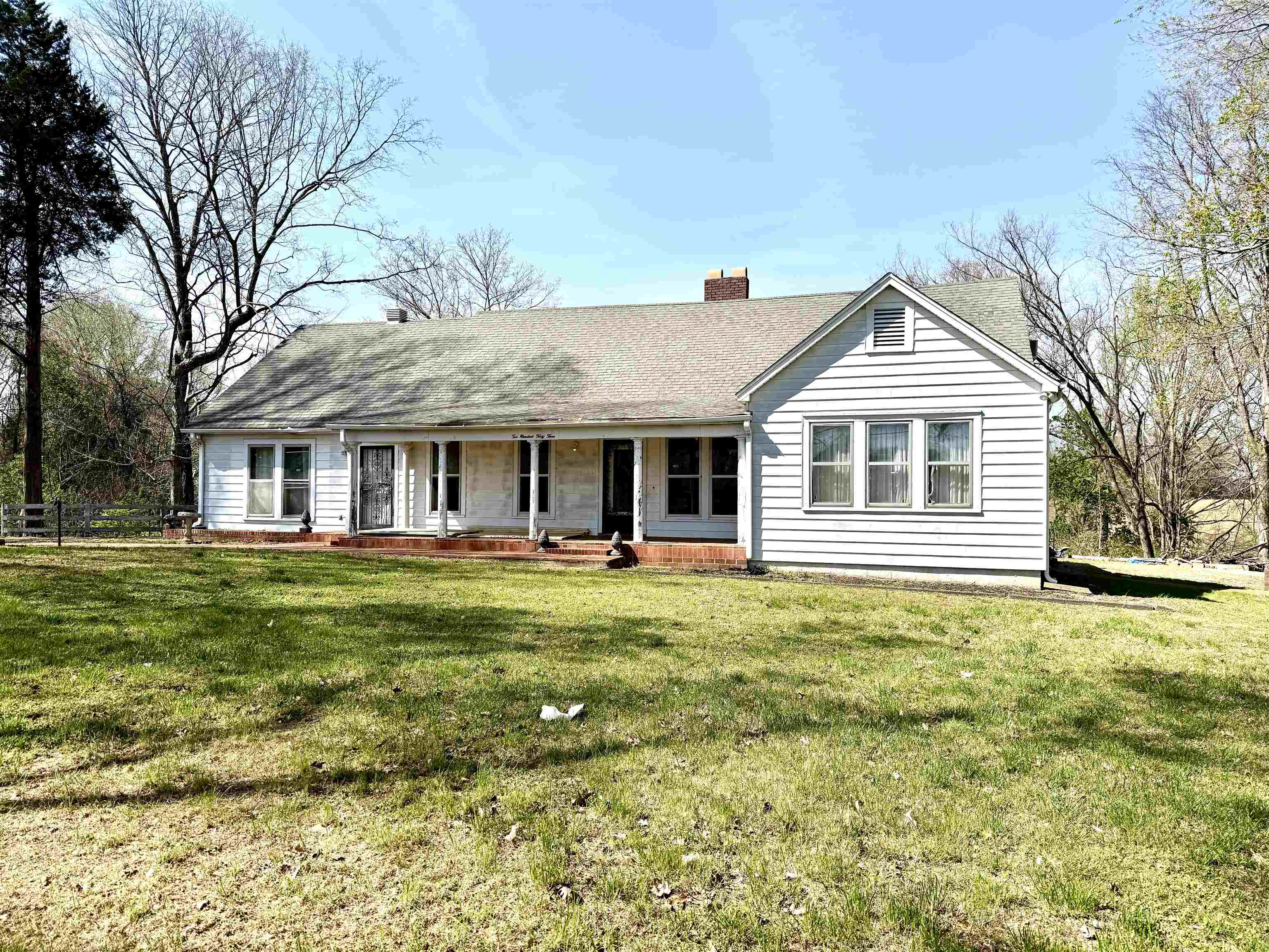 243 East End Street Ripley, TN 38063 - Photo 9 of 17 a front view of a house with a garden