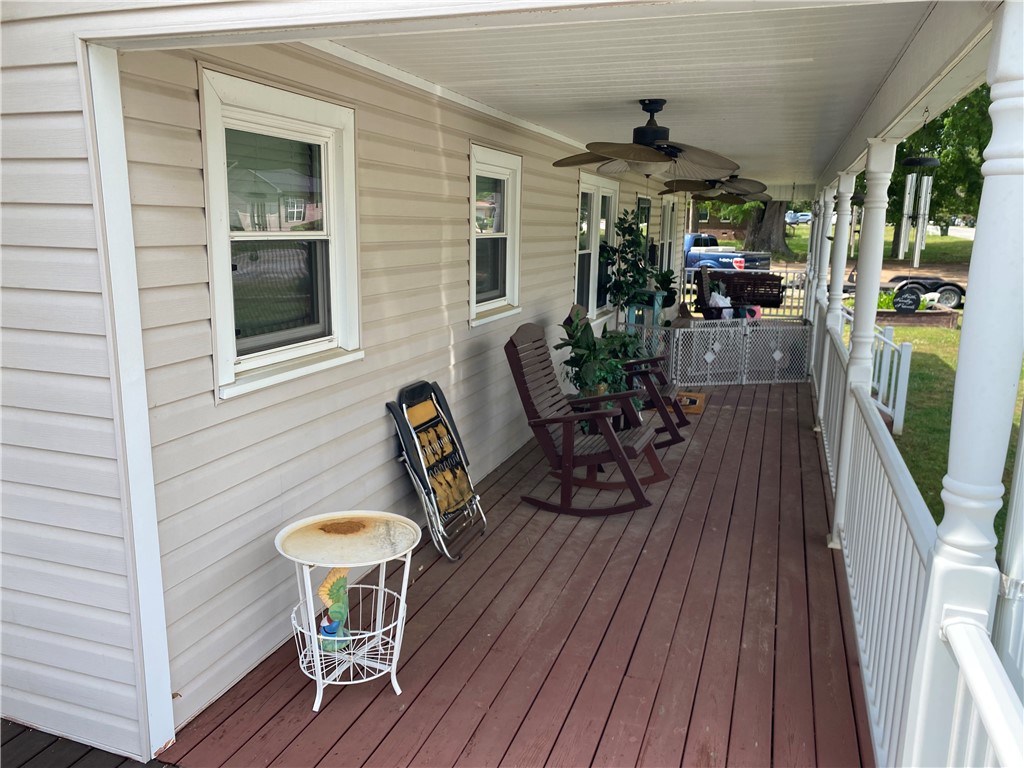 3 Heyward Avenue Honea Path, SC 29654 - Photo 3 of 35 Relax on this inviting porch, offering a seamless blend of comfort and outdoor living.