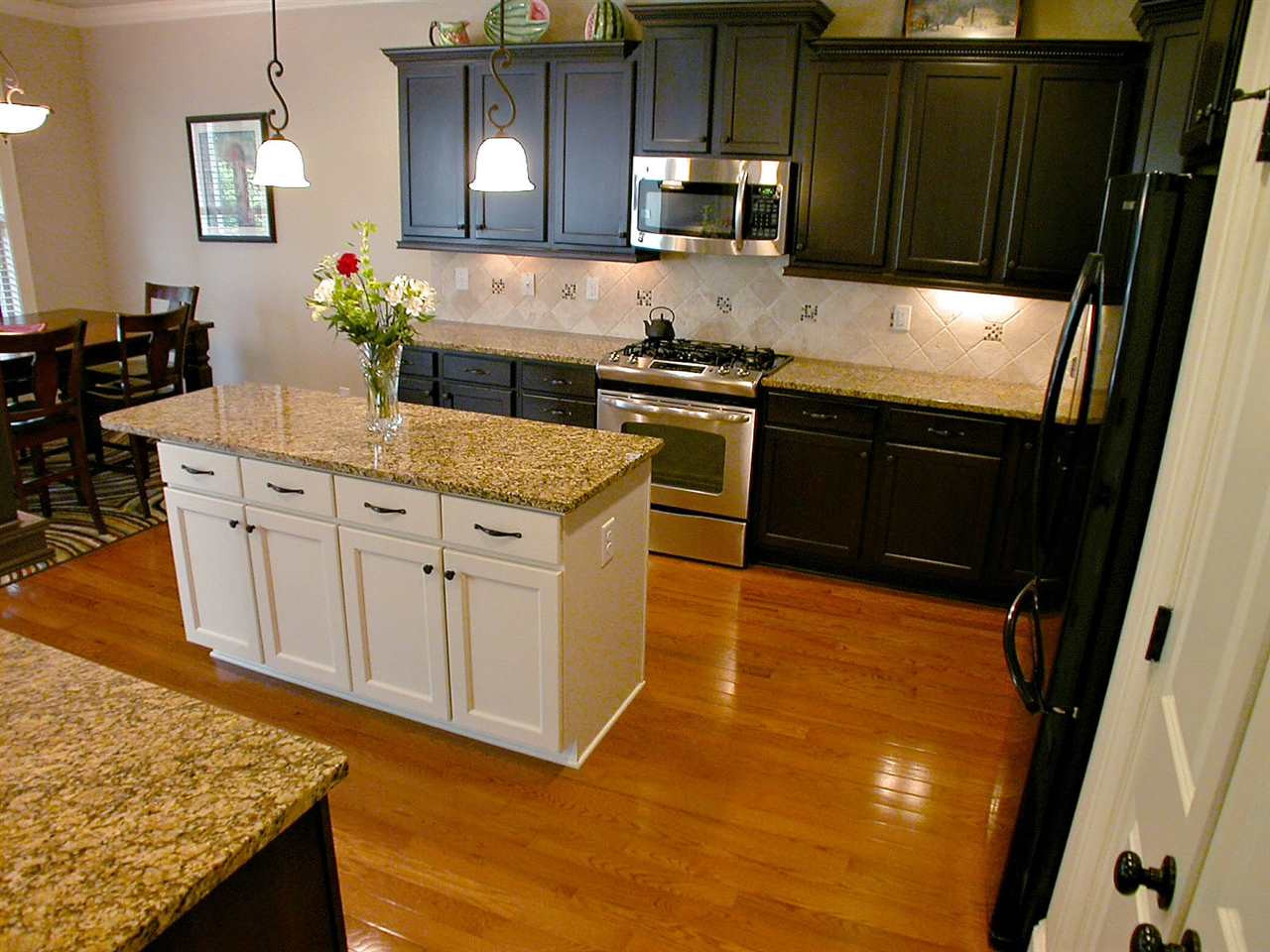 12349 Beestone Lane Raleigh, NC 27614 - Photo 9 of 25 Enjoy preparing delicious meals in this chef's kitchen. Spacious enough for two cooks! Kitchen