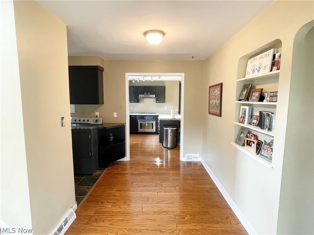 5528 Huron Road Lyndhurst, OH 44124 - Photo 5 of 26 Formal Dining Room w/ hardwood floors