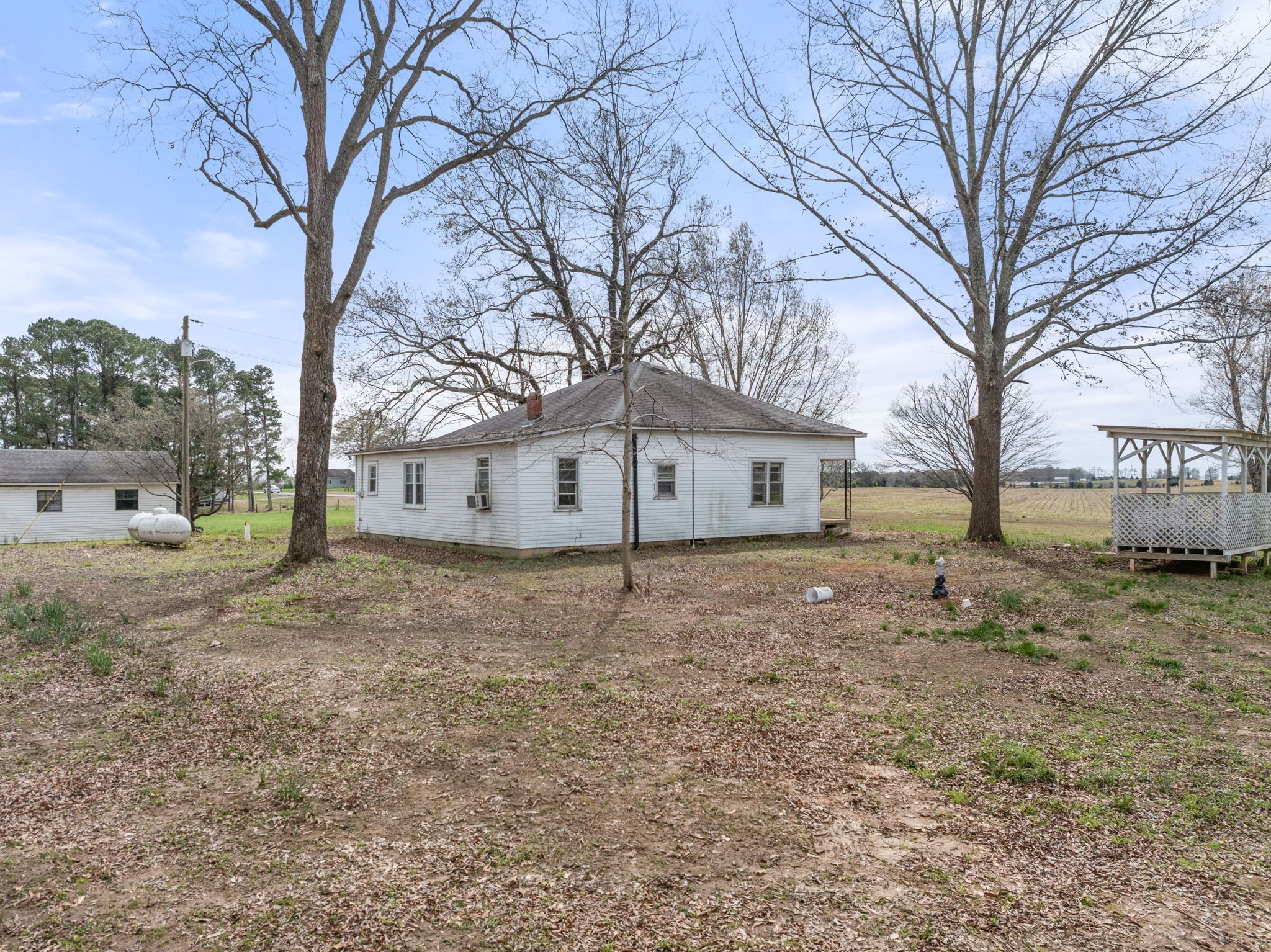 11051 Highway 64 Lexington, AL 35648 - Photo 20 of 44 a view of a house with a yard covered in snow