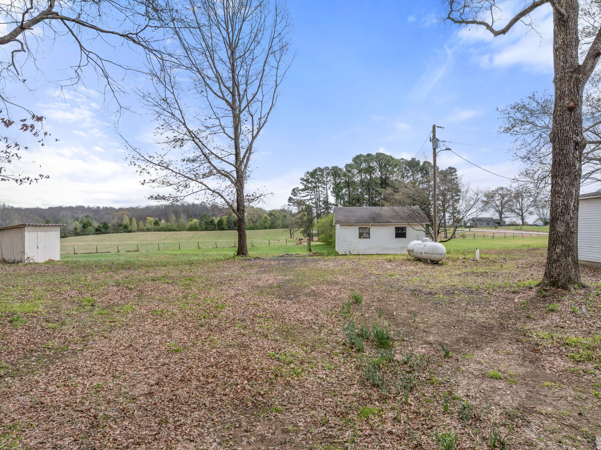11051 Highway 64 Lexington, AL 35648 - Photo 21 of 44 a view of a house with a yard