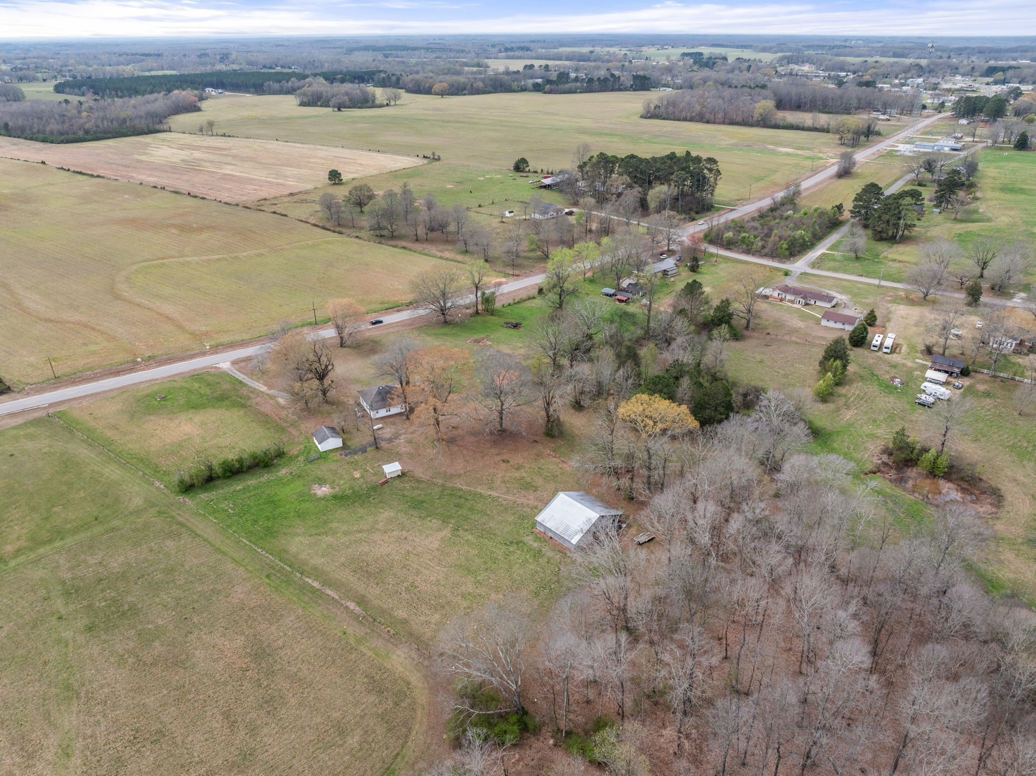 11051 Highway 64 Lexington, AL 35648 - Photo 44 of 44 an aerial view of a houses with a lake