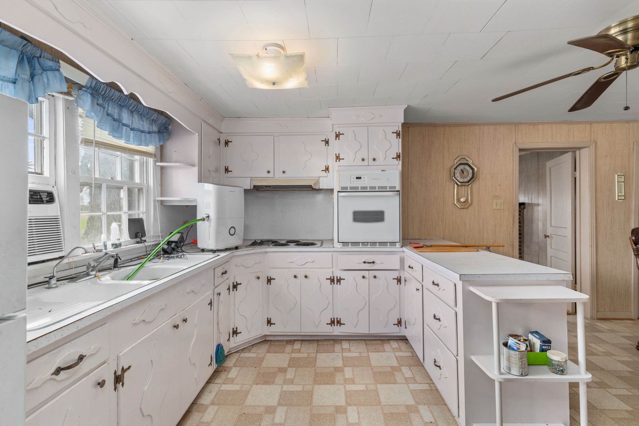 11051 Highway 64 Lexington, AL 35648 - Photo 7 of 44 a kitchen with granite countertop a sink stove and cabinets