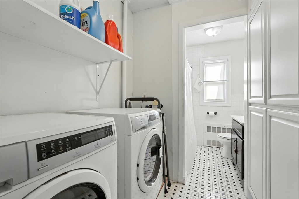 66 Applewood Drive, Unit 66 Chicopee, MA 01022 - Photo 17 of 25 a utility room with dryer and washer