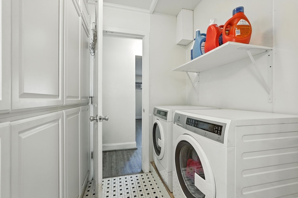 66 Applewood Drive, Unit 66 Chicopee, MA 01022 - Photo 19 of 25 a utility room with dryer and washer