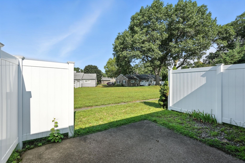 66 Applewood Drive, Unit 66 Chicopee, MA 01022 - Photo 22 of 25 a view of a back yard