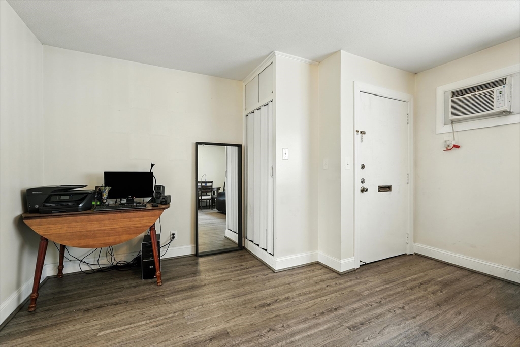 66 Applewood Drive, Unit 66 Chicopee, MA 01022 - Photo 10 of 25 a room with furniture and wooden floor