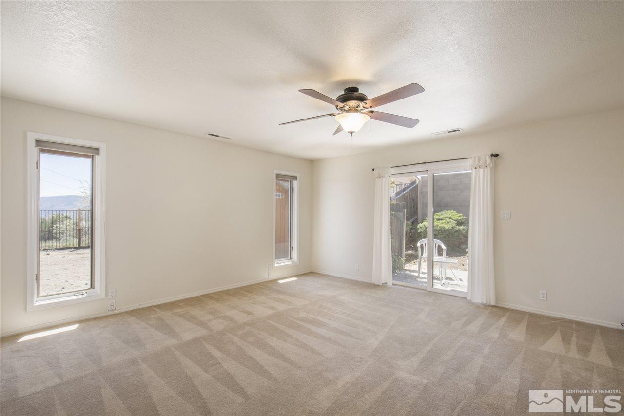12560 Thomas Creek Road Reno, NV 89511 - Photo 14 of 20 a view of an empty room with a window