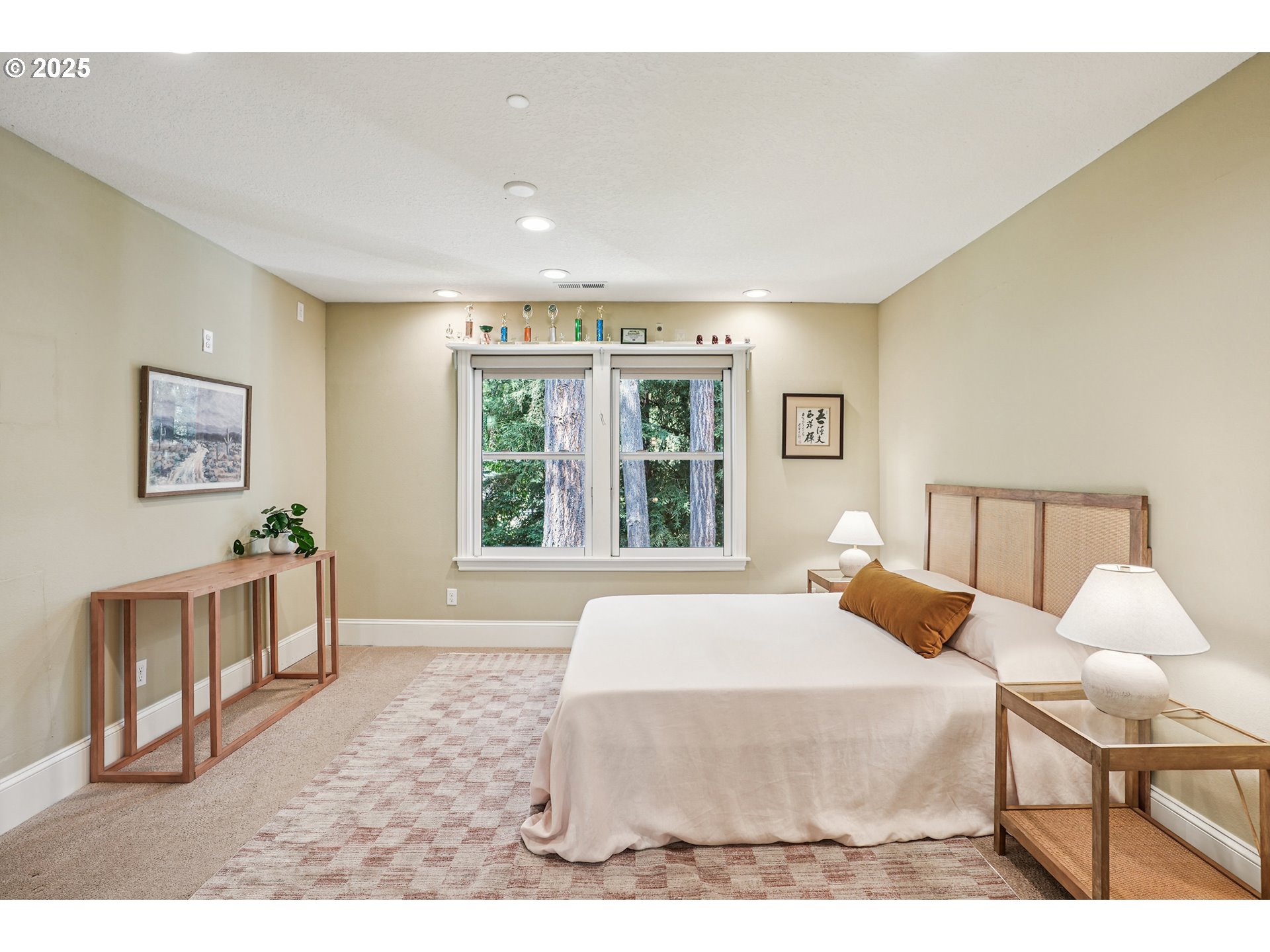 1621 Southeast McBrod Avenue Milwaukie, OR 97222 - Photo 24 of 41 a bedroom with a bed and a large window