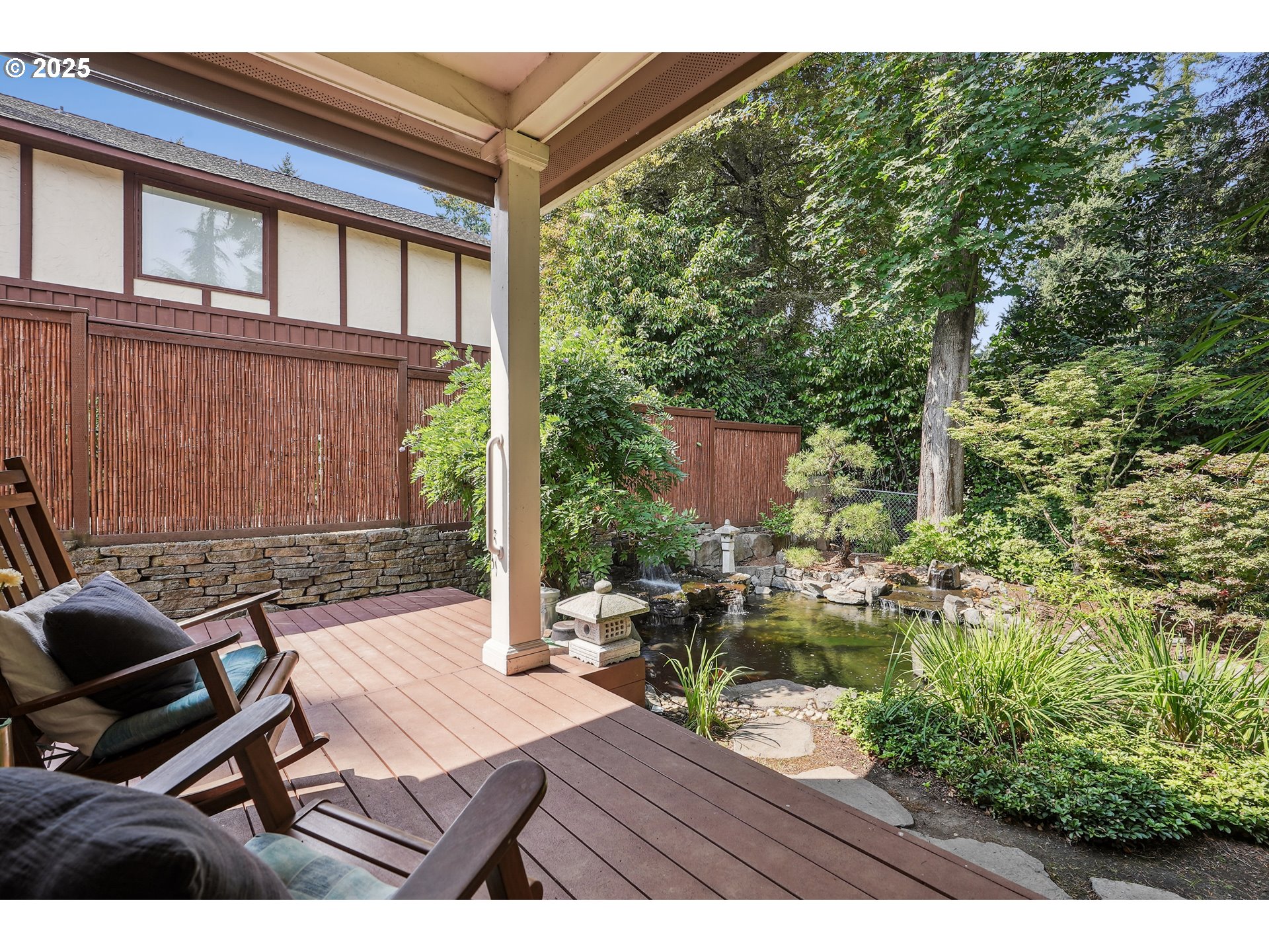 1621 Southeast McBrod Avenue Milwaukie, OR 97222 - Photo 33 of 41 a wooden bench sitting in front of a building