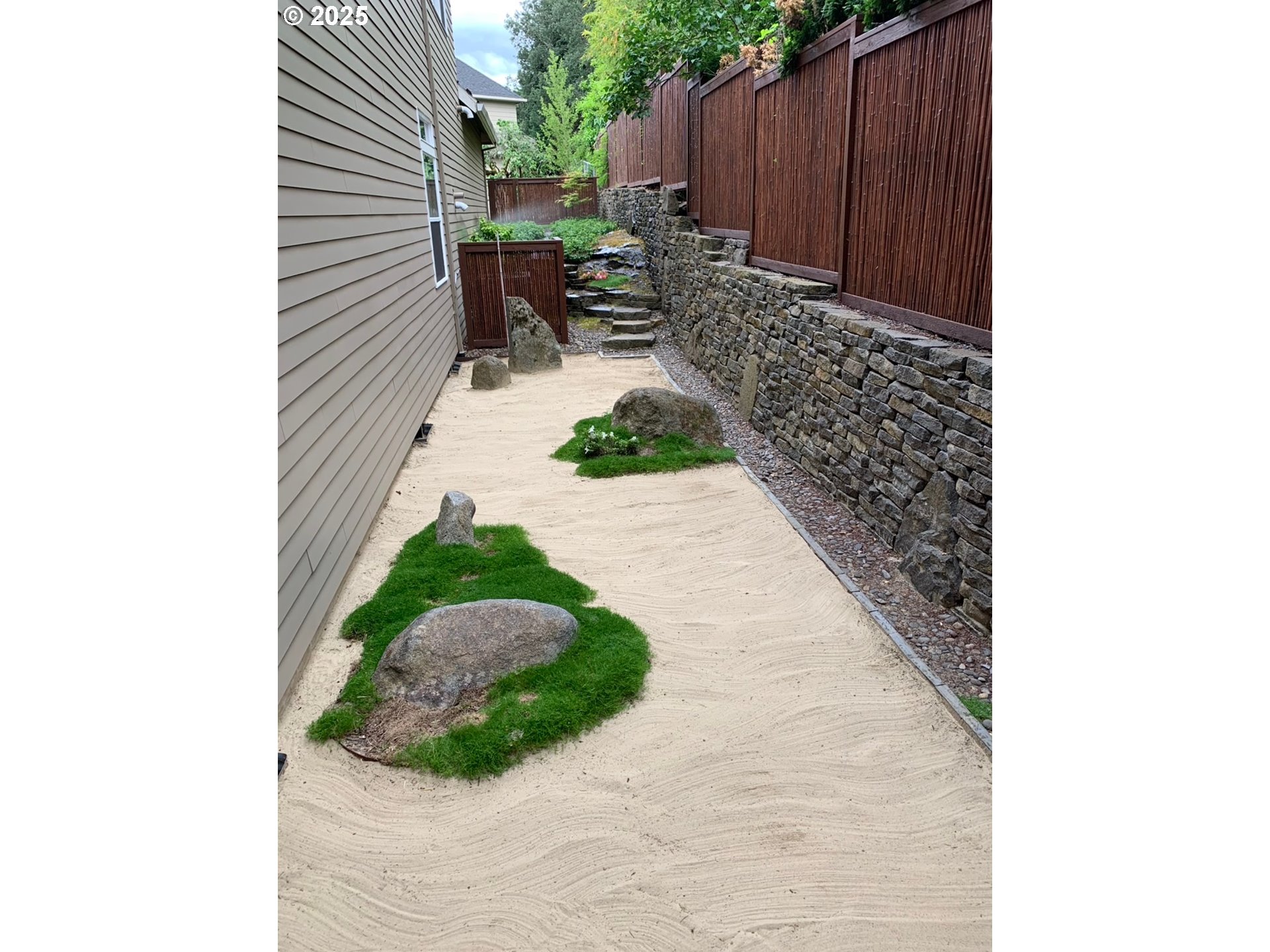 1621 Southeast McBrod Avenue Milwaukie, OR 97222 - Photo 36 of 41 a view of backyard with potted plants and wooden fence