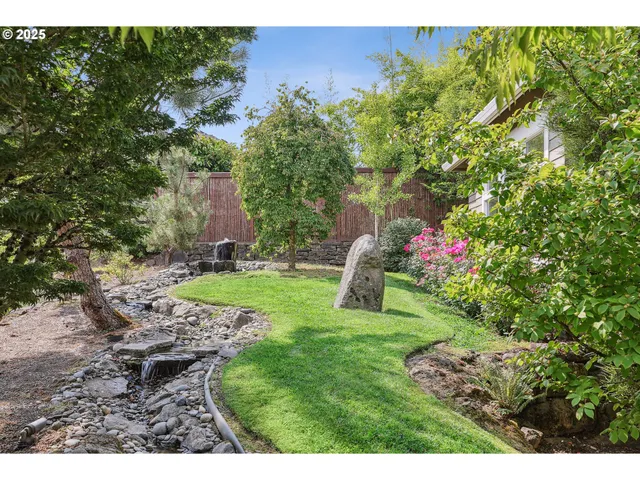 a view of a yard in front of a house