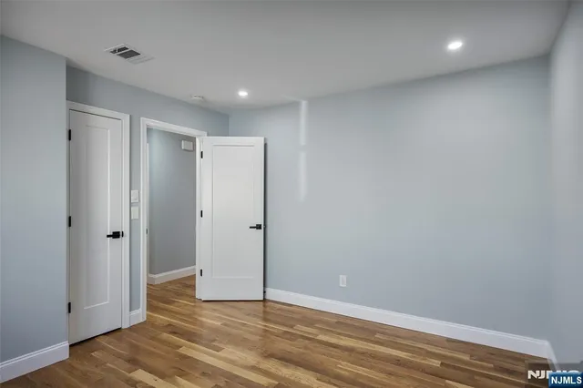 a bathroom with a shower and a sink