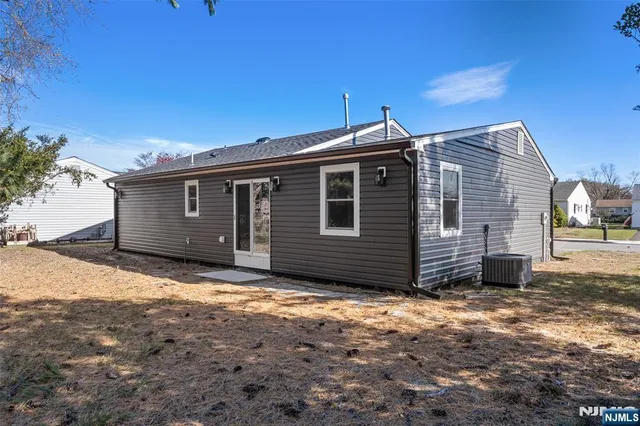 a view of a tree with a yard