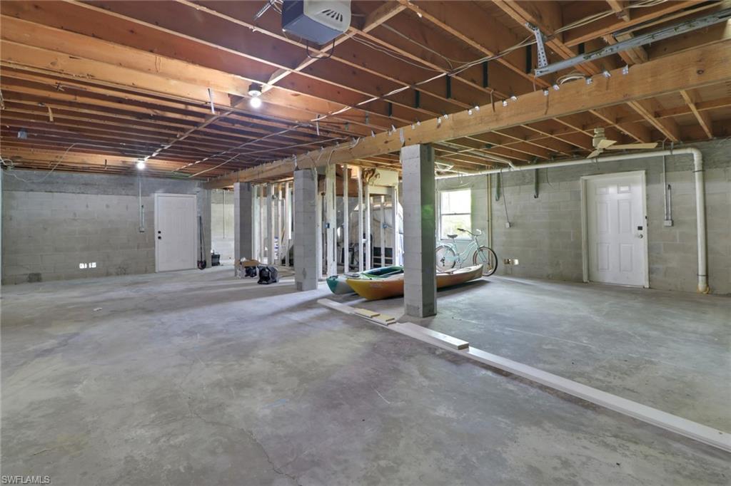 3659 Riviera Circle Bonita Springs, FL 34134 - Photo 16 of 31 a view of an indoor parking space