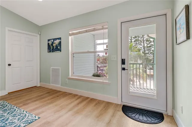 a room with window and a wooden floor