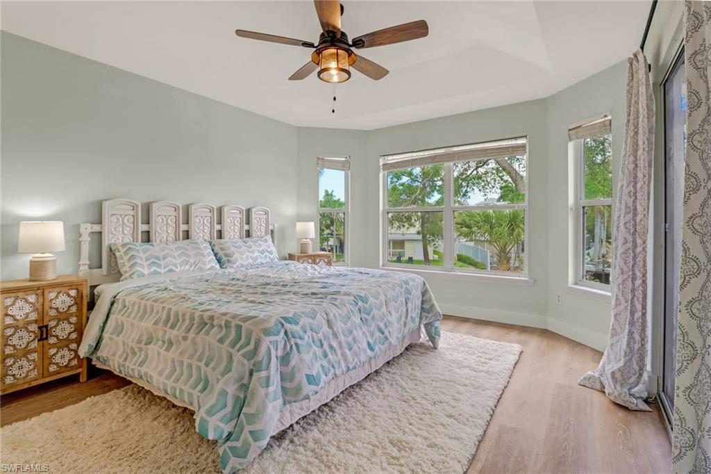3659 Riviera Circle Bonita Springs, FL 34134 - Photo 22 of 31 a bedroom with a bed and a window