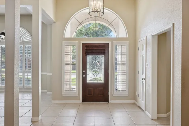 a view of an entryway with a front door