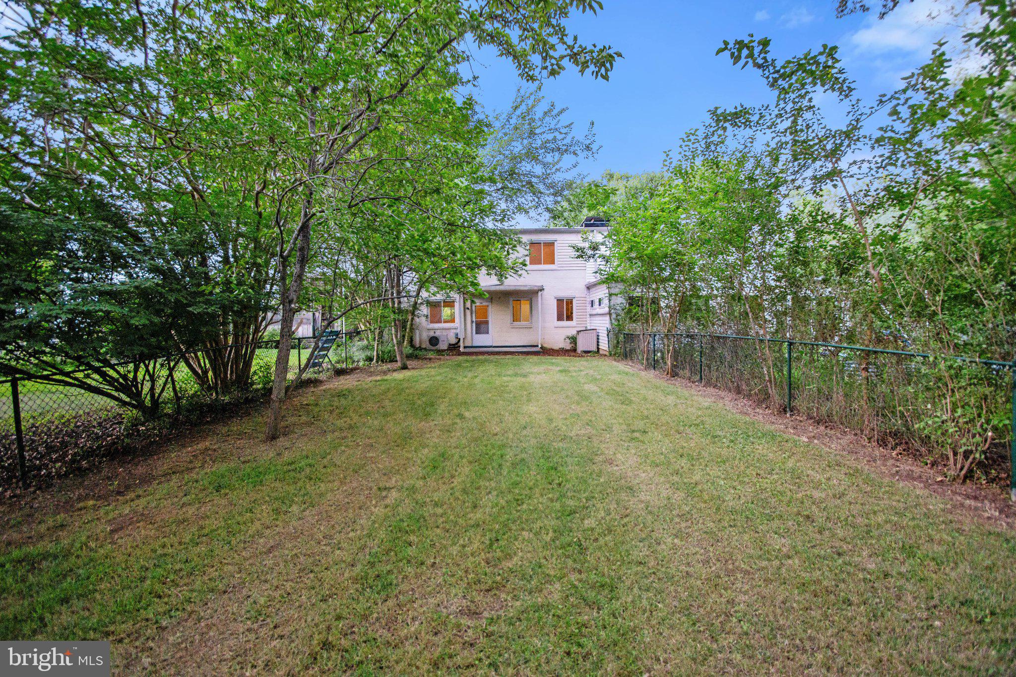 30 Ridge Road, Unit B Greenbelt, MD 20770 - Photo 29 of 30 Charming home with lush greenery.