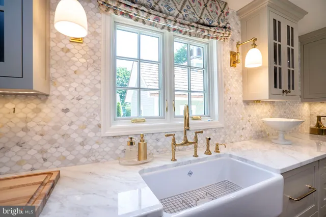 a living room with furniture wooden floor and a table