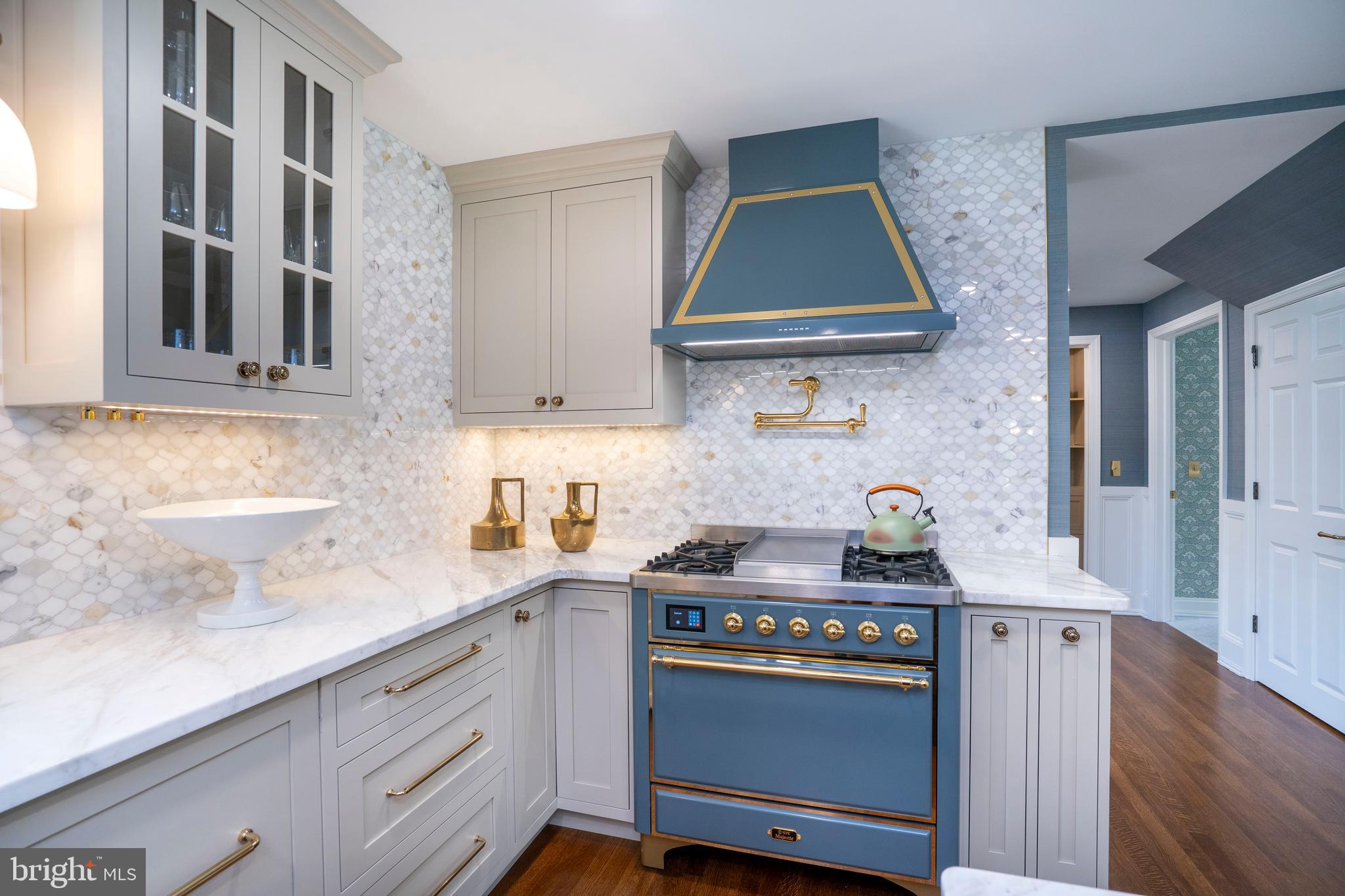 619 McKee Street State College, PA 16803 - Photo 31 of 101 a kitchen with stainless steel appliances a sink a stove and cabinets