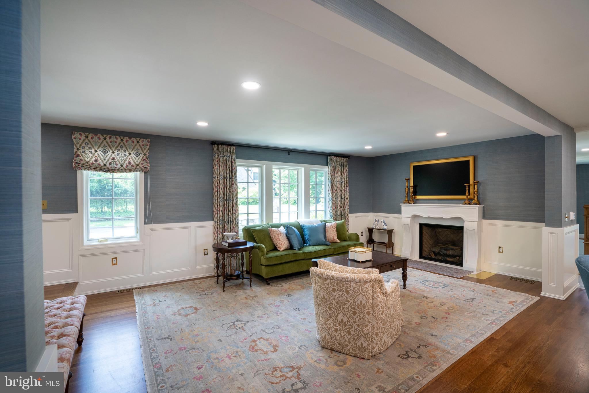 619 McKee Street State College, PA 16803 - Photo 37 of 101 a living room with furniture a fireplace and a flat screen tv