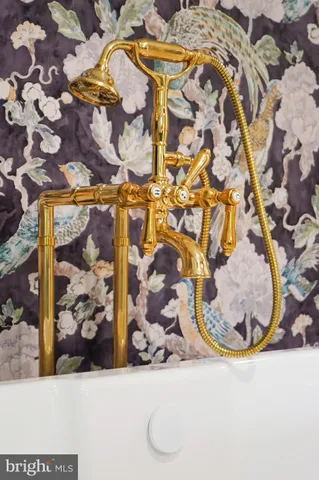 a media room with lots of chairs and a projector