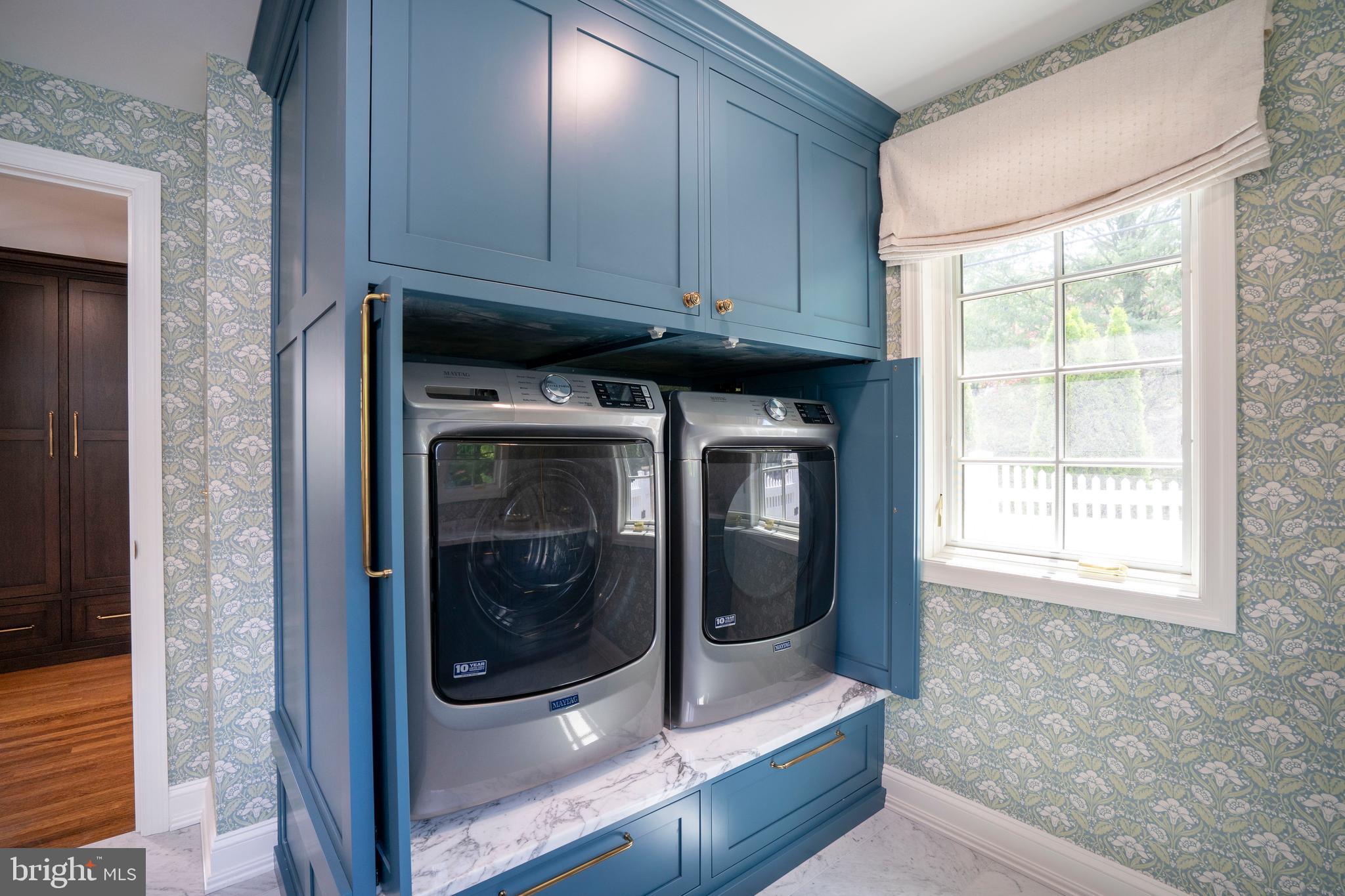 619 McKee Street State College, PA 16803 - Photo 60 of 101 a utility room with wooden floor washer and dryer