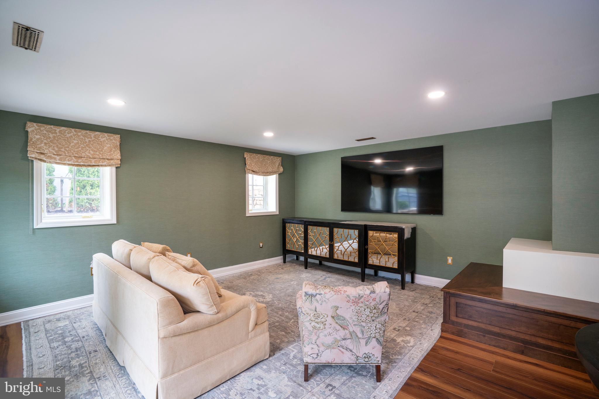 619 McKee Street State College, PA 16803 - Photo 67 of 101 a living room with furniture and a flat screen tv