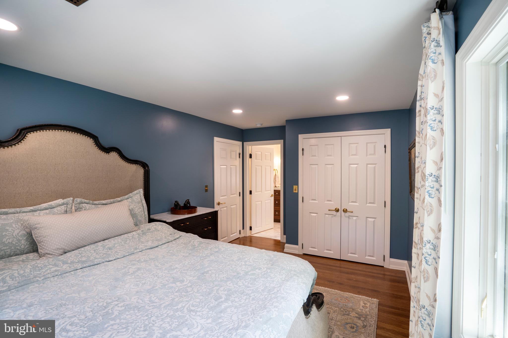 619 McKee Street State College, PA 16803 - Photo 80 of 101 a spacious bedroom with a bed and wooden floor