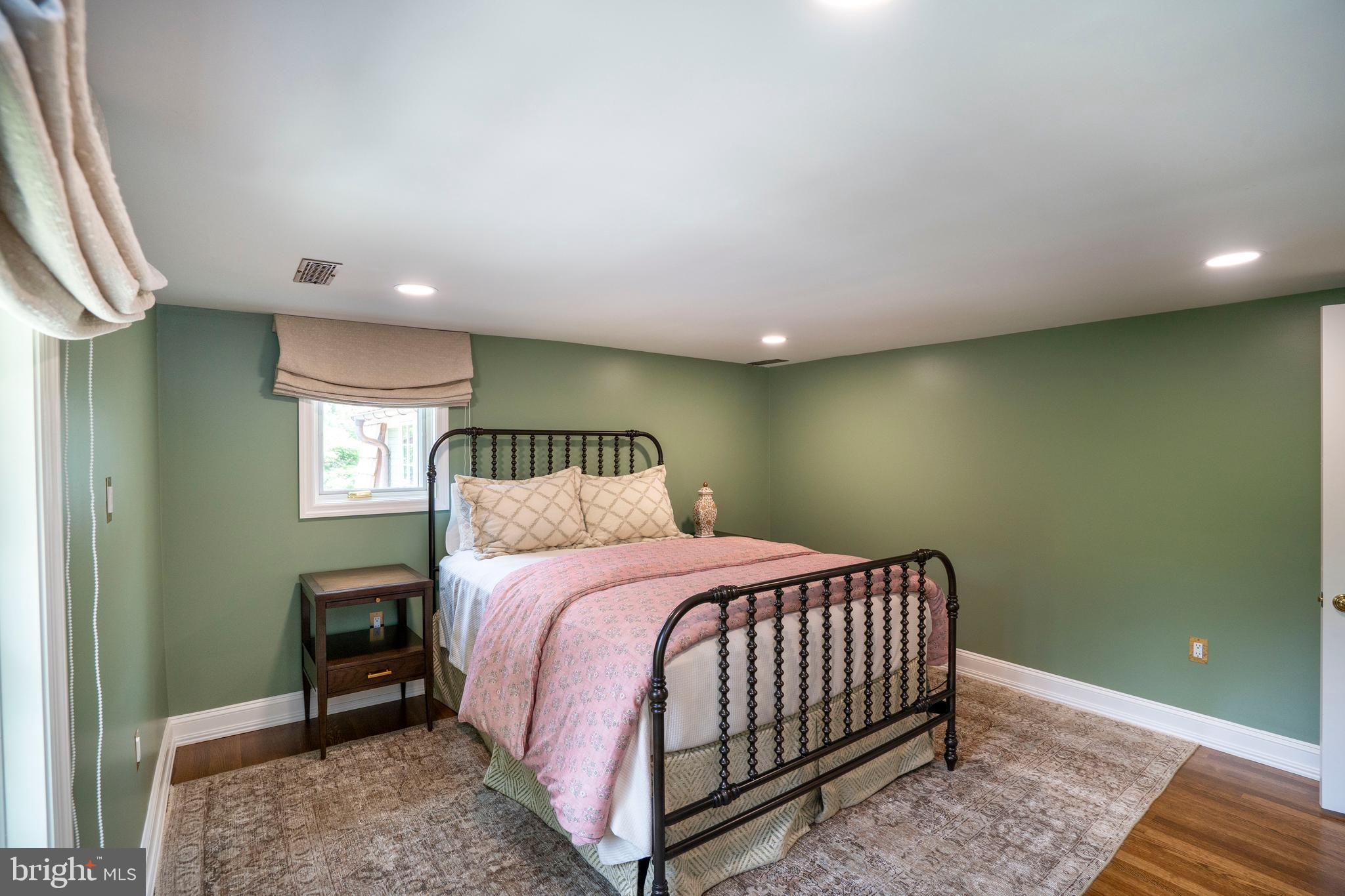 619 McKee Street State College, PA 16803 - Photo 86 of 101 a bedroom with a bed and a night stand