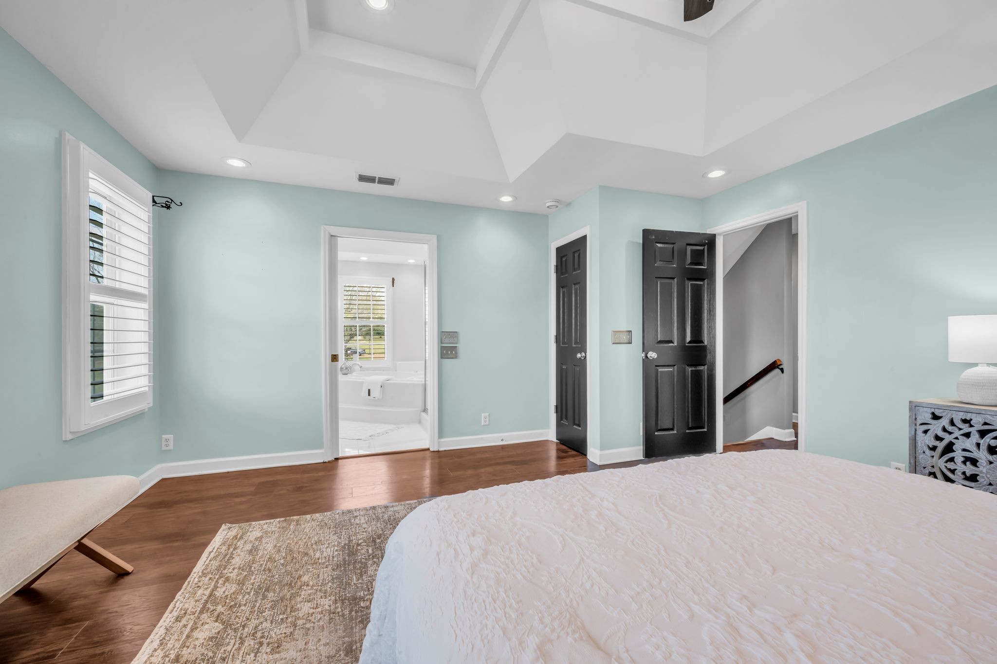 108 Lake Valley Road Dickson, TN 37055 - Photo 26 of 42 a bedroom with a bed and wooden floor
