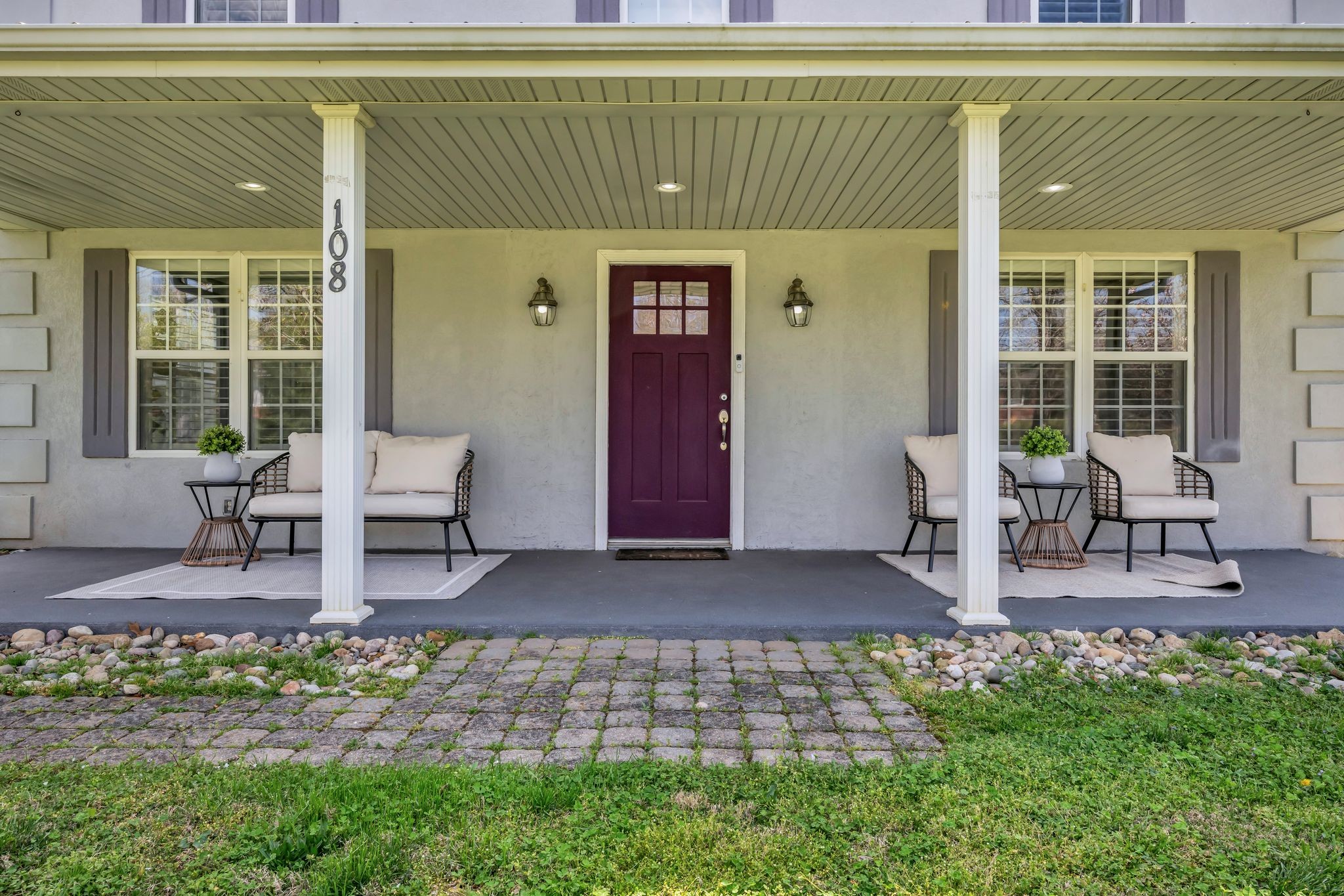 108 Lake Valley Road Dickson, TN 37055 - Photo 7 of 42 a view of front door with table and chairs and potted plants