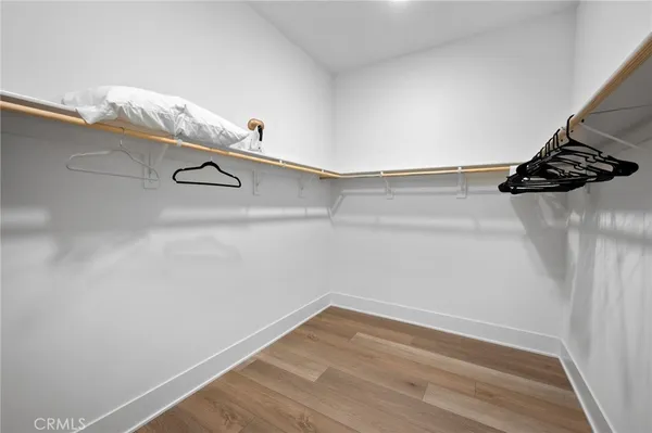 a table with a vase and flowers on it