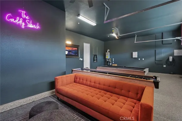 a outdoor living space with furniture and a potted plant