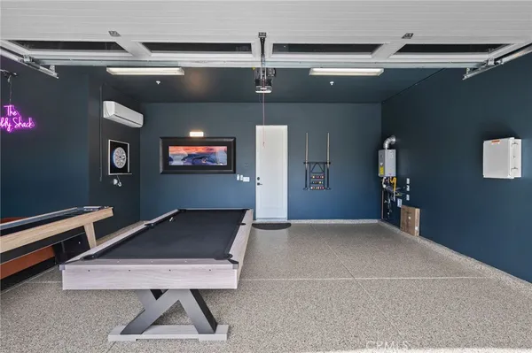 a kitchen with stainless steel appliances granite countertop sink stove and cabinets