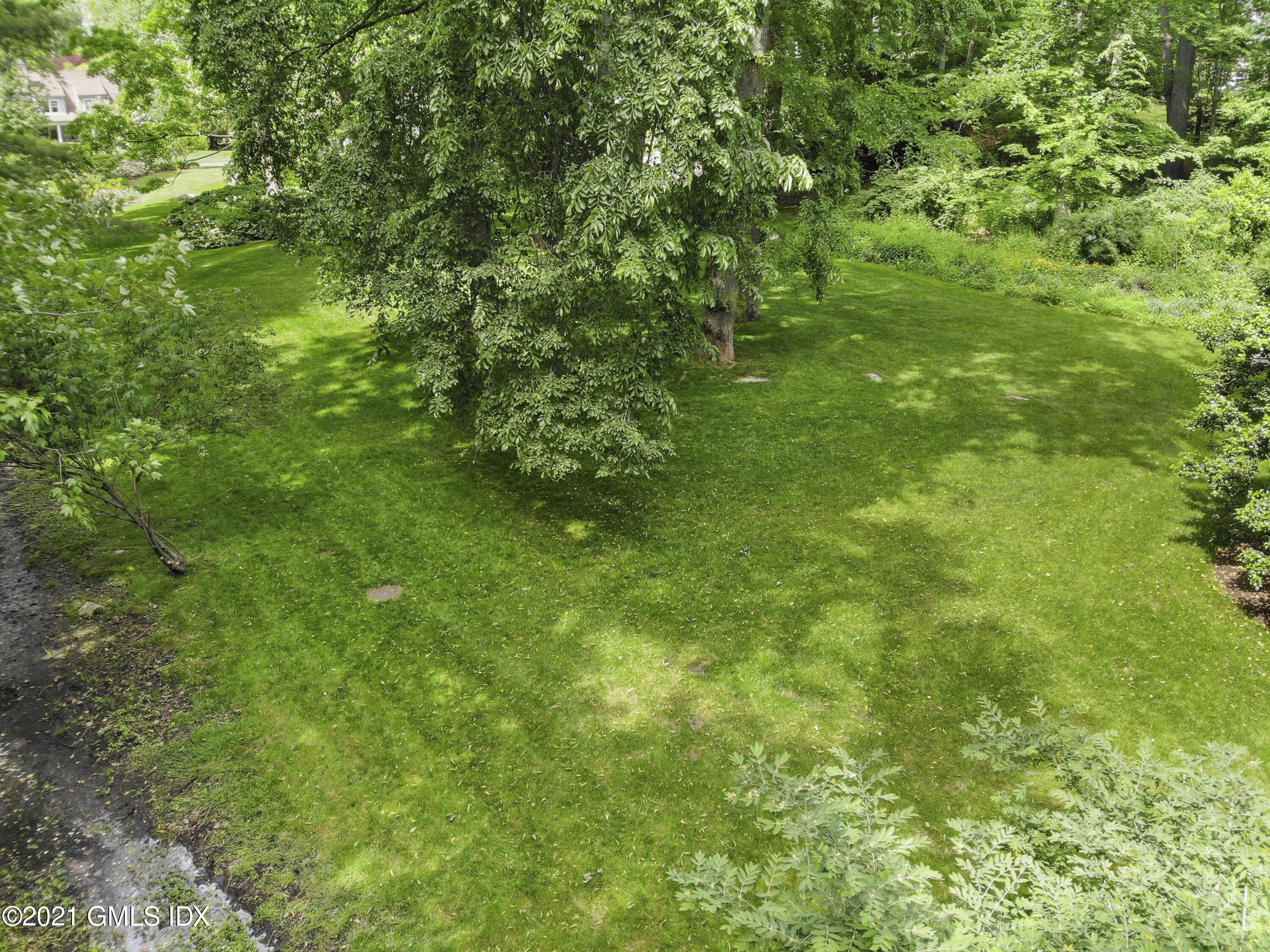 0 Hendrie Avenue Riverside, CT 06878 - Photo 3 of 6 a view of a lush green space