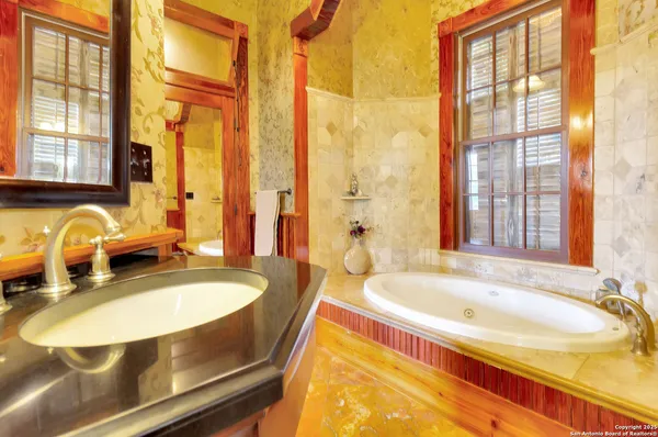 a bathroom with sink and a bathtub