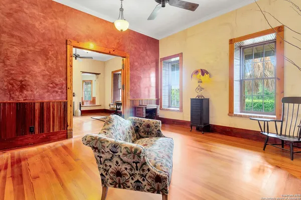 a living room with furniture and a window