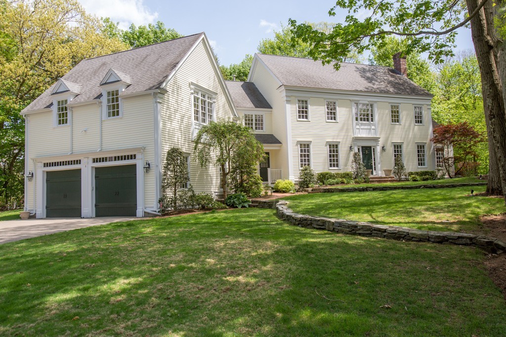 8 Cushing Road Wellesley, MA 02481 - Photo 2 of 17 a front view of a house with a yard