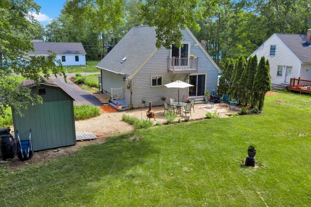 47 Horseshoe Circle Ware, MA 01082 - Photo 5 of 37 a view of a house with a yard and sitting area