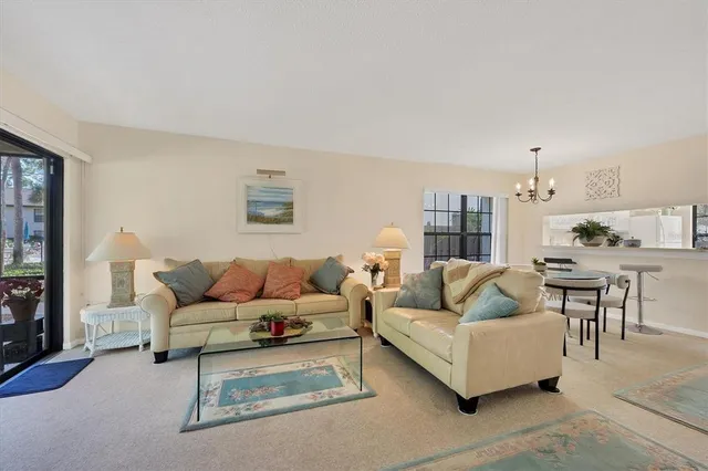 a living room with furniture and a couch