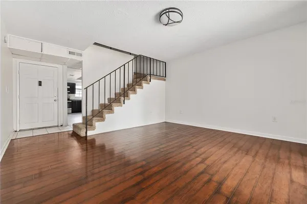 a view of entryway with wooden floor