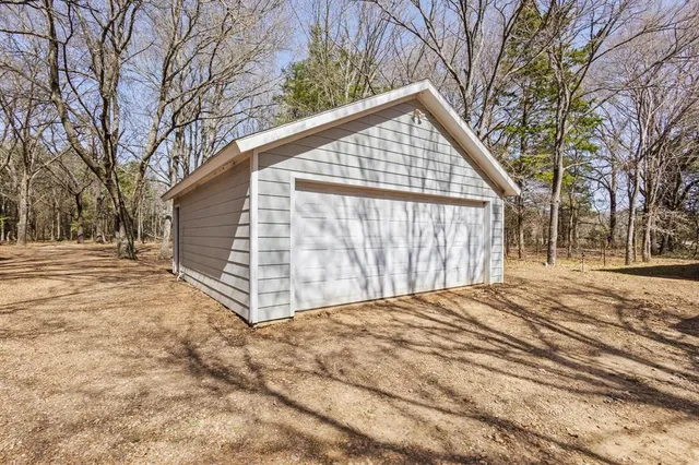 a view of backyard of house