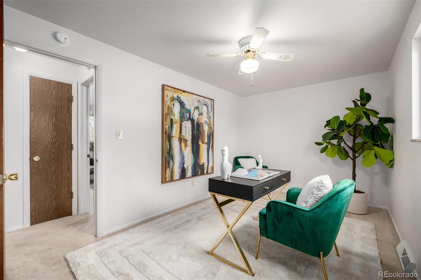 7720 Kendall Street Arvada, CO 80003 - Photo 16 of 45 a workspace with furniture and a chandelier